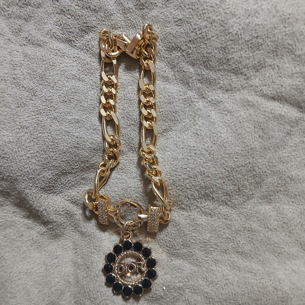 Gold and Black Dior Chain Bracelet.